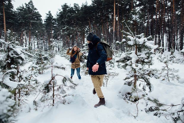 couple-love-have-fun-playing-snowball-snowy-pine-forest